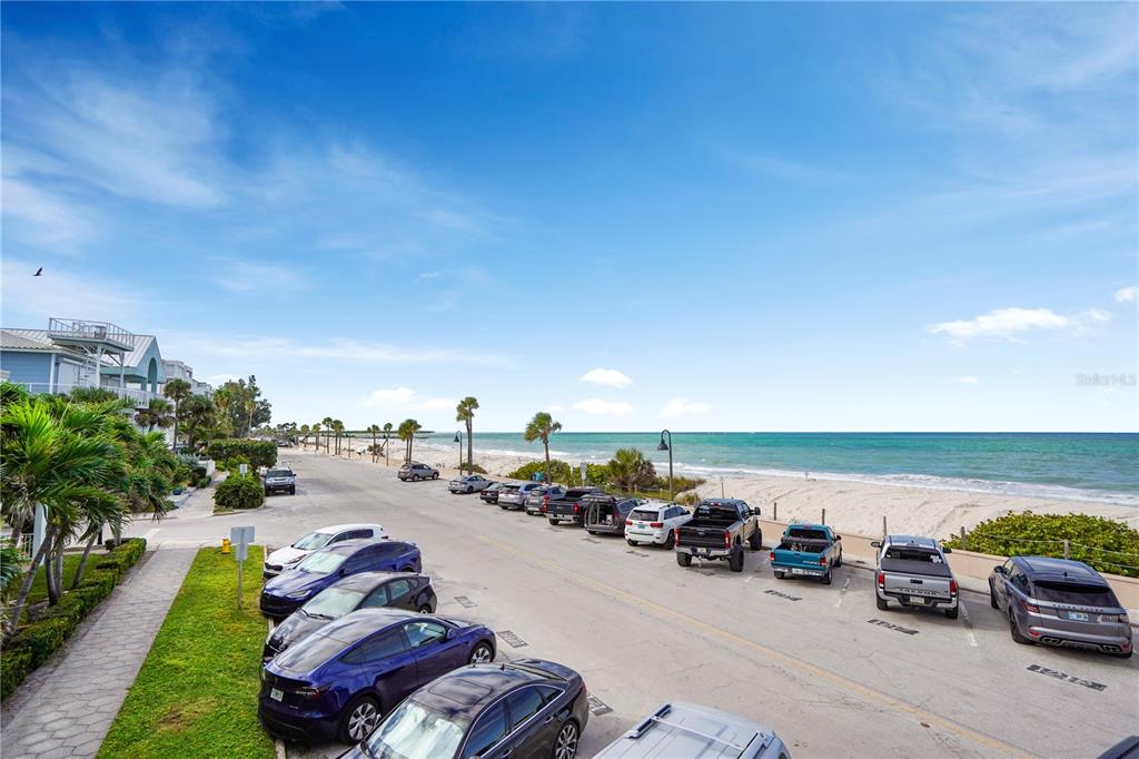 709 Gulf Way, Unit 19 St. Pete Beach, FL 33706 - Photo 5 of 39 a view of a terrace with lawn chairs