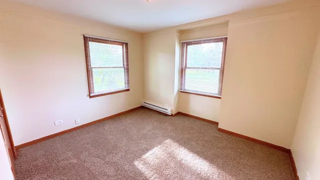 an empty room with windows