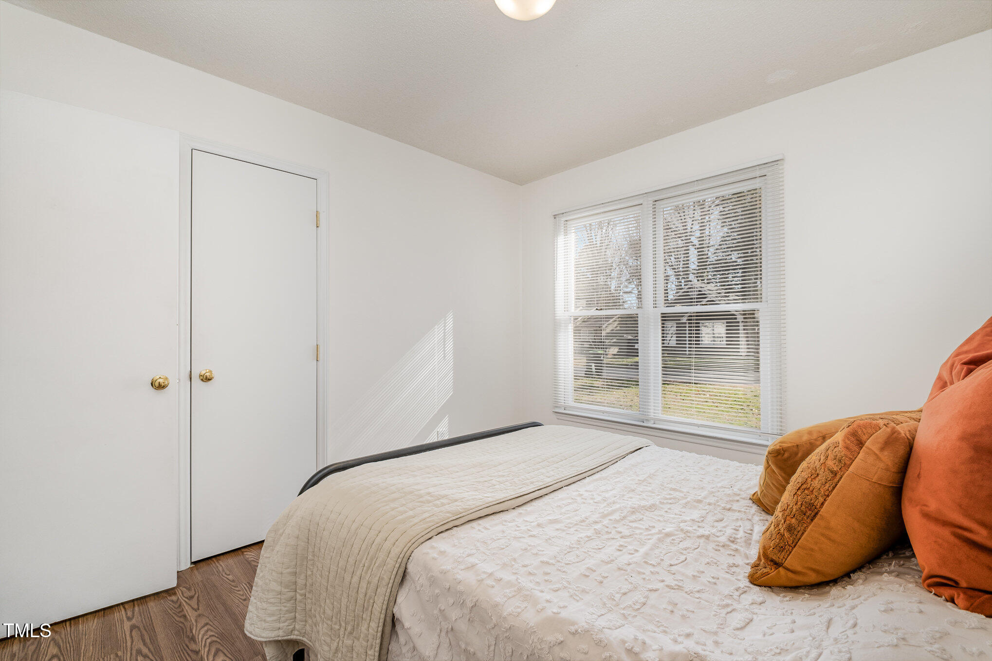 4213 Timberbrook Drive Raleigh, NC 27616 - Photo 17 of 37 a bedroom with a bed and a window