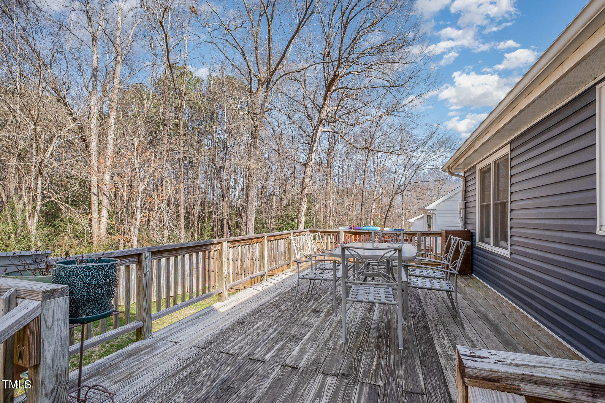 4213 Timberbrook Drive Raleigh, NC 27616 - Photo 21 of 37 a view of backyard with deck and wooden floor