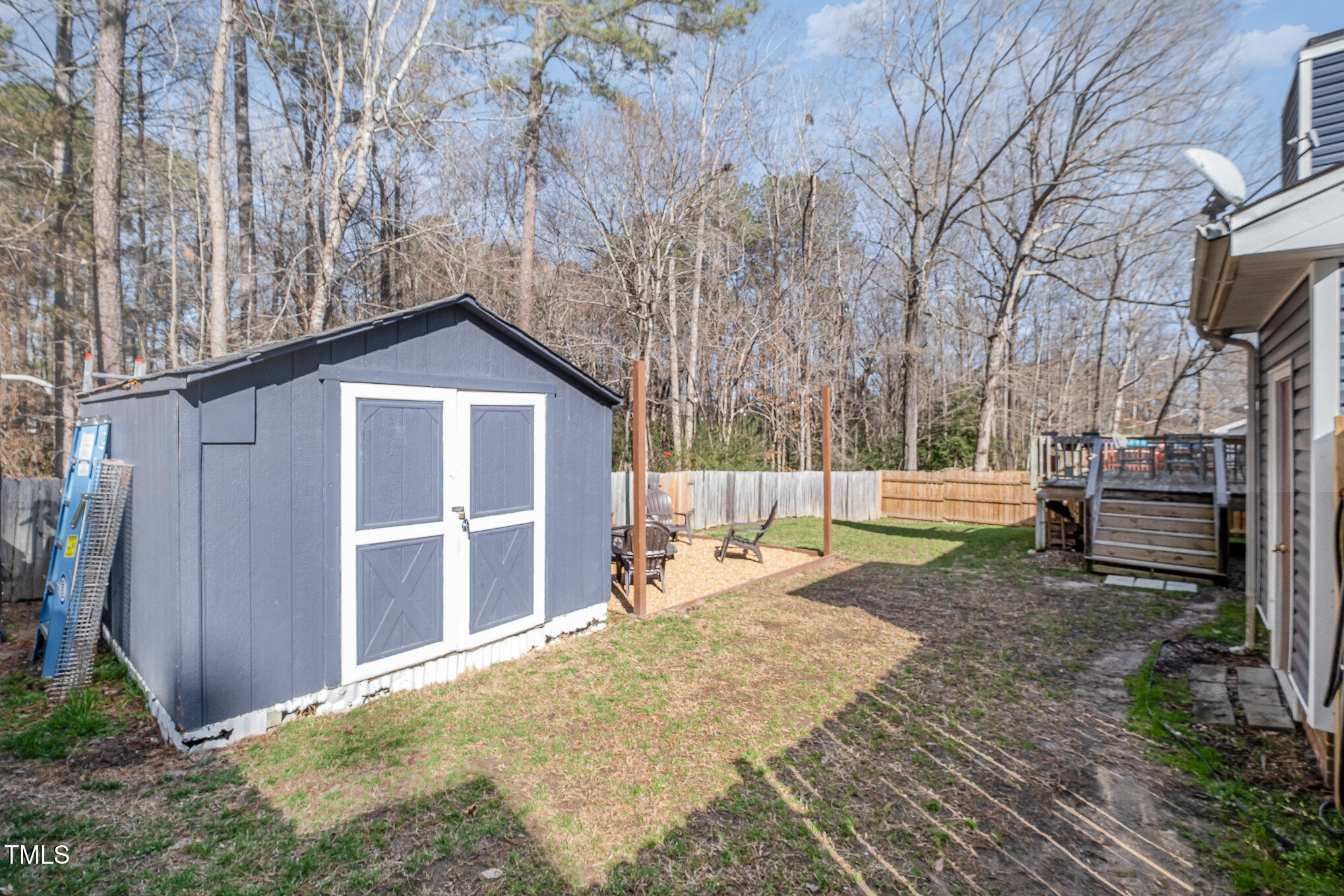 4213 Timberbrook Drive Raleigh, NC 27616 - Photo 25 of 37 a view of a house with backyard and trees