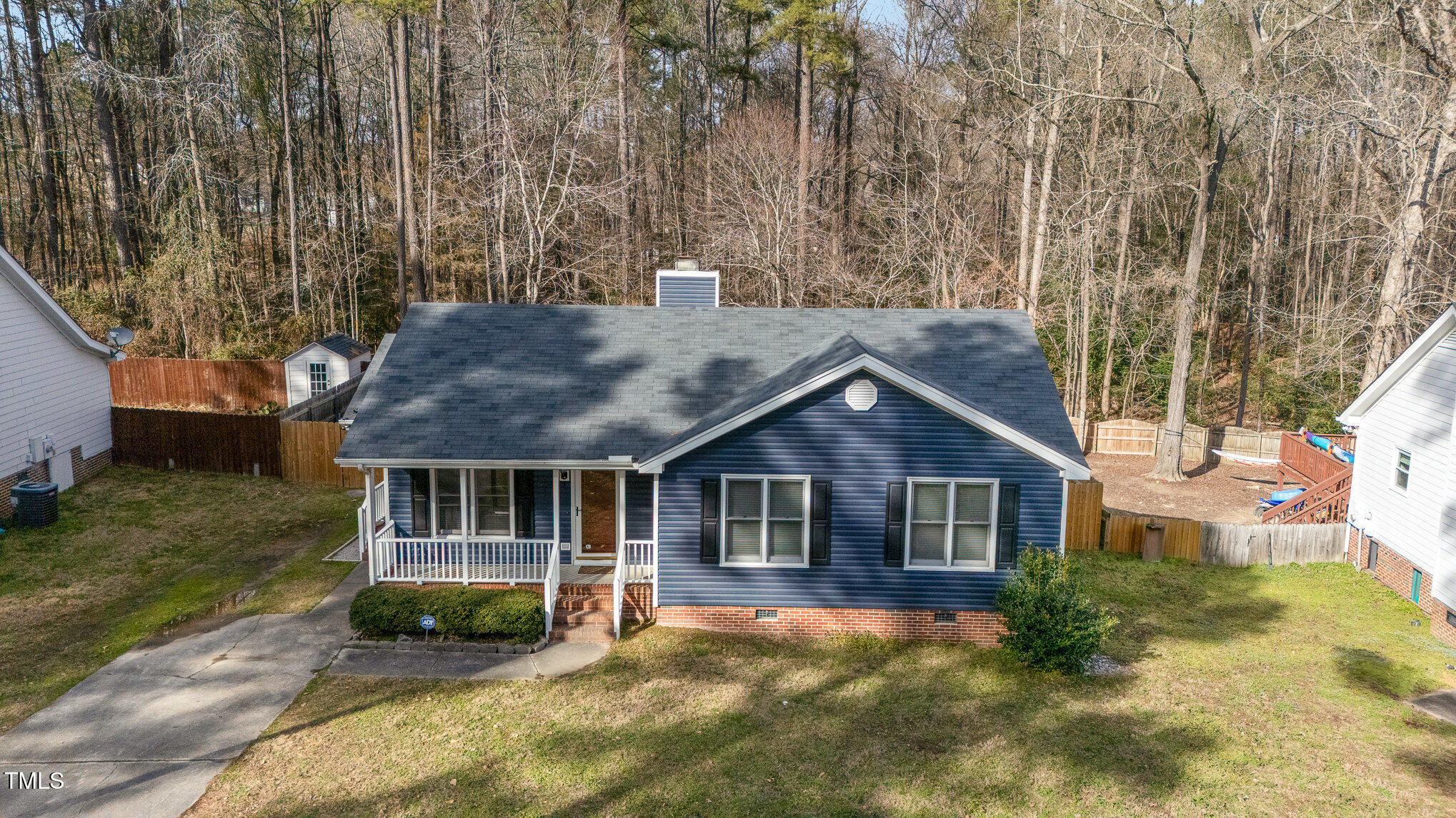 4213 Timberbrook Drive Raleigh, NC 27616 - Photo 29 of 37 a front view of a house with a yard