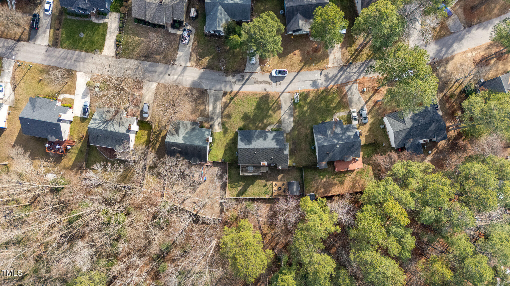 4213 Timberbrook Drive Raleigh, NC 27616 - Photo 32 of 37 an aerial view of a house with a yard and sitting space