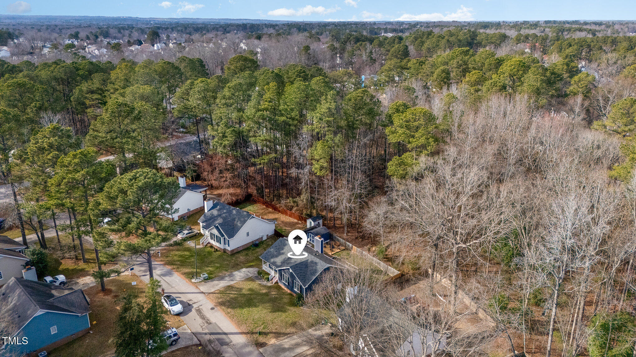 4213 Timberbrook Drive Raleigh, NC 27616 - Photo 35 of 37 a view of a lake with a forest