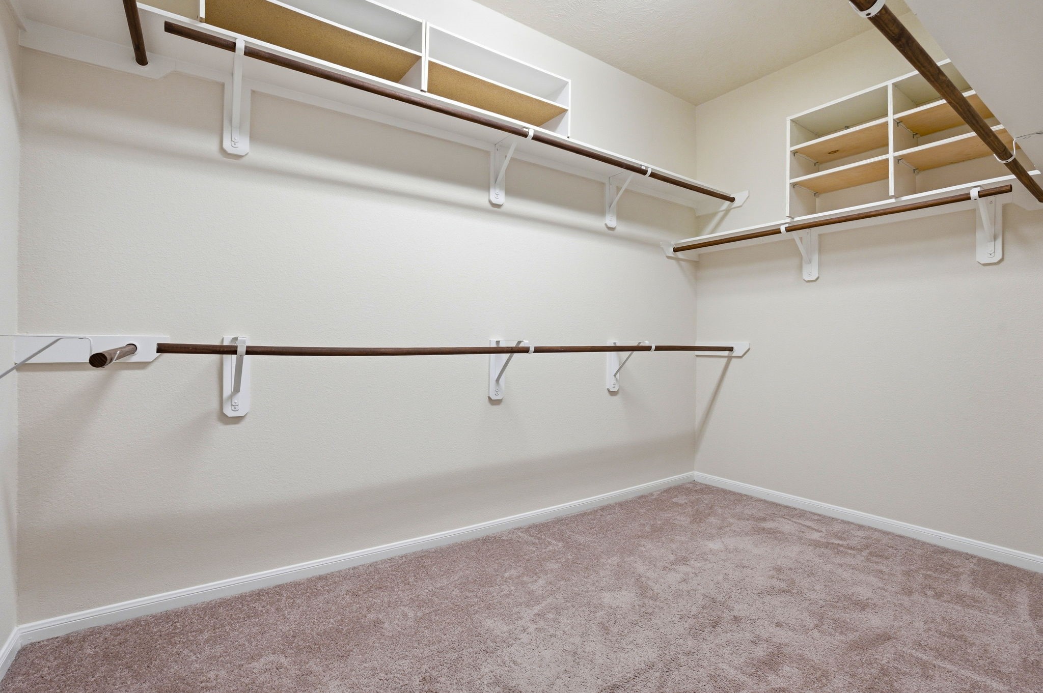 10007 Open Slope Court Humble, TX 77396 - Photo 25 of 39 a view of a room with racks on the wall