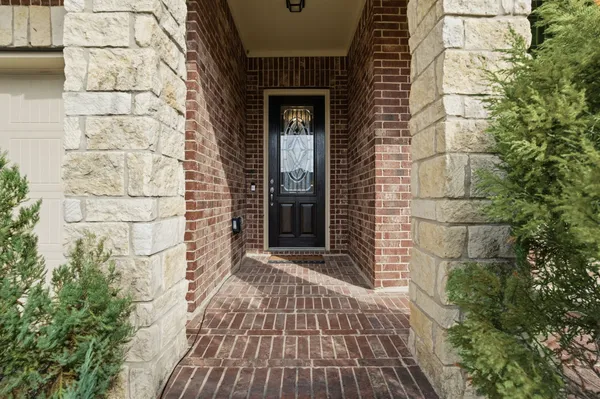 a view of a brick house with a window