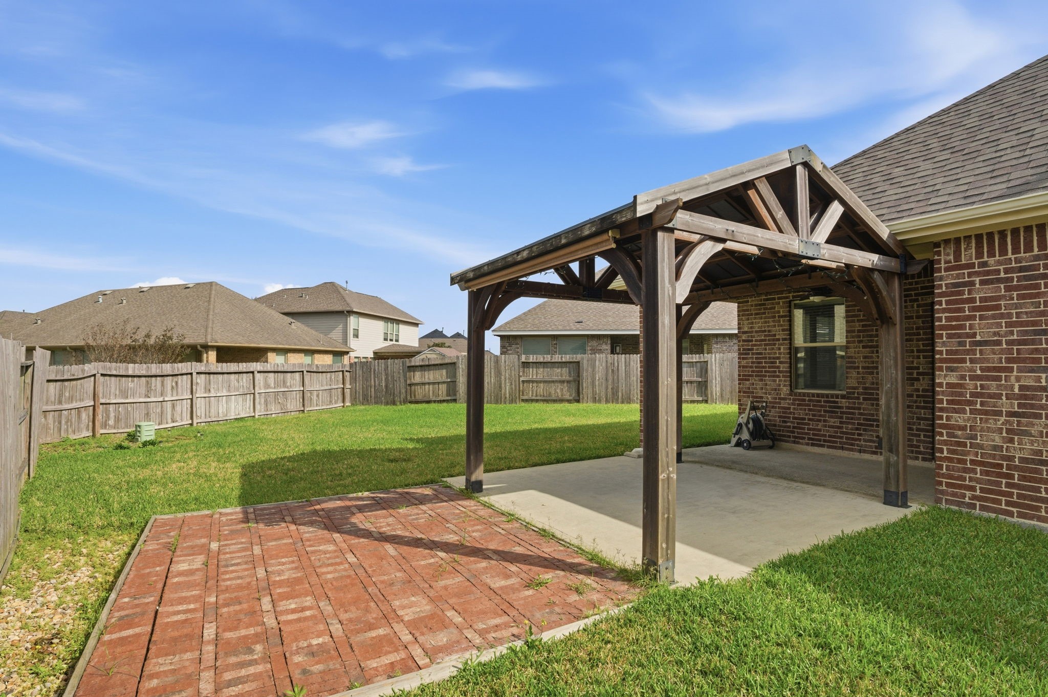 10007 Open Slope Court Humble, TX 77396 - Photo 34 of 39 a front view of a house with garden