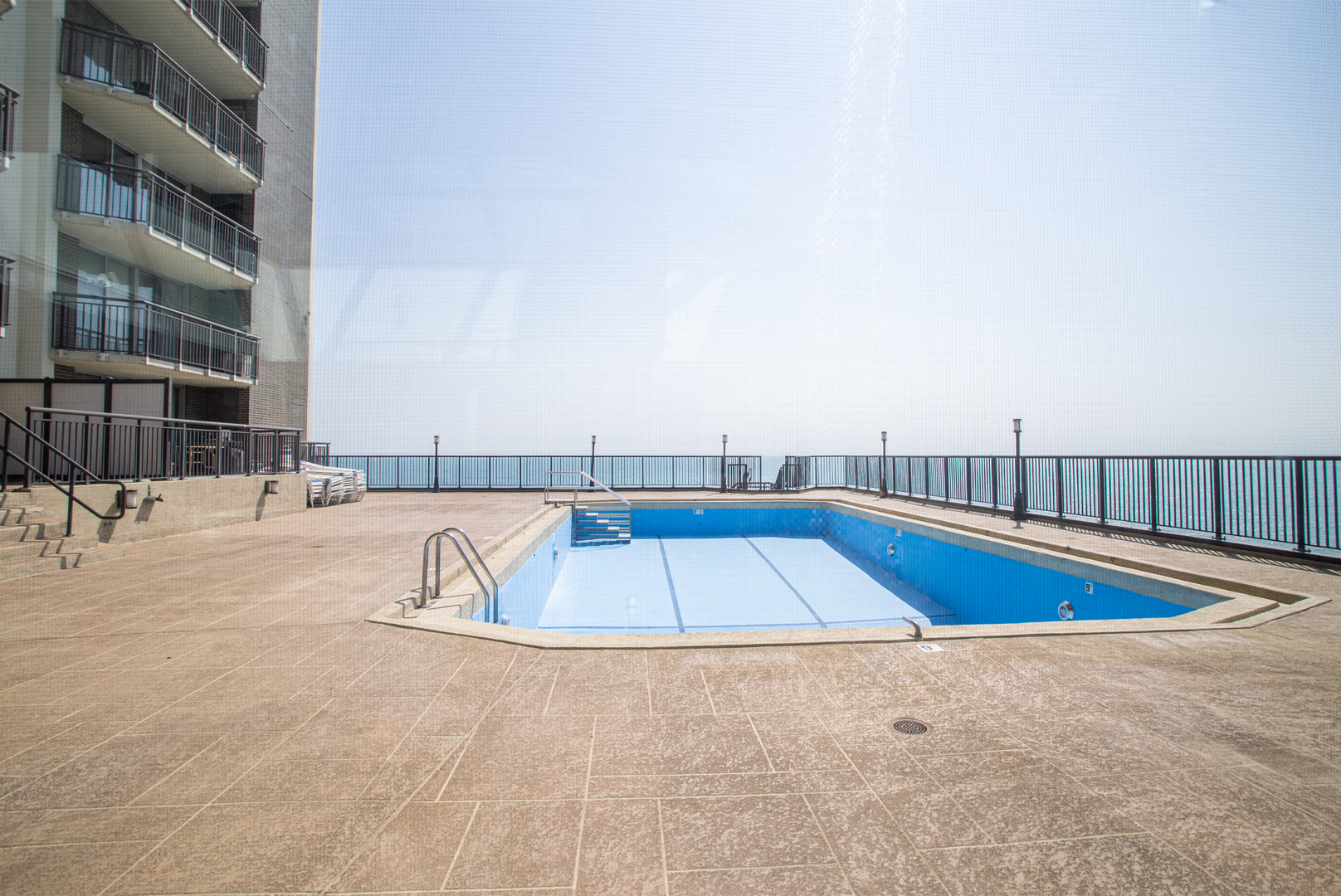 6007 North Sheridan Road, Unit 39D Chicago, IL 60660 - Photo 2 of 20 a view of outdoor space and swimming pool