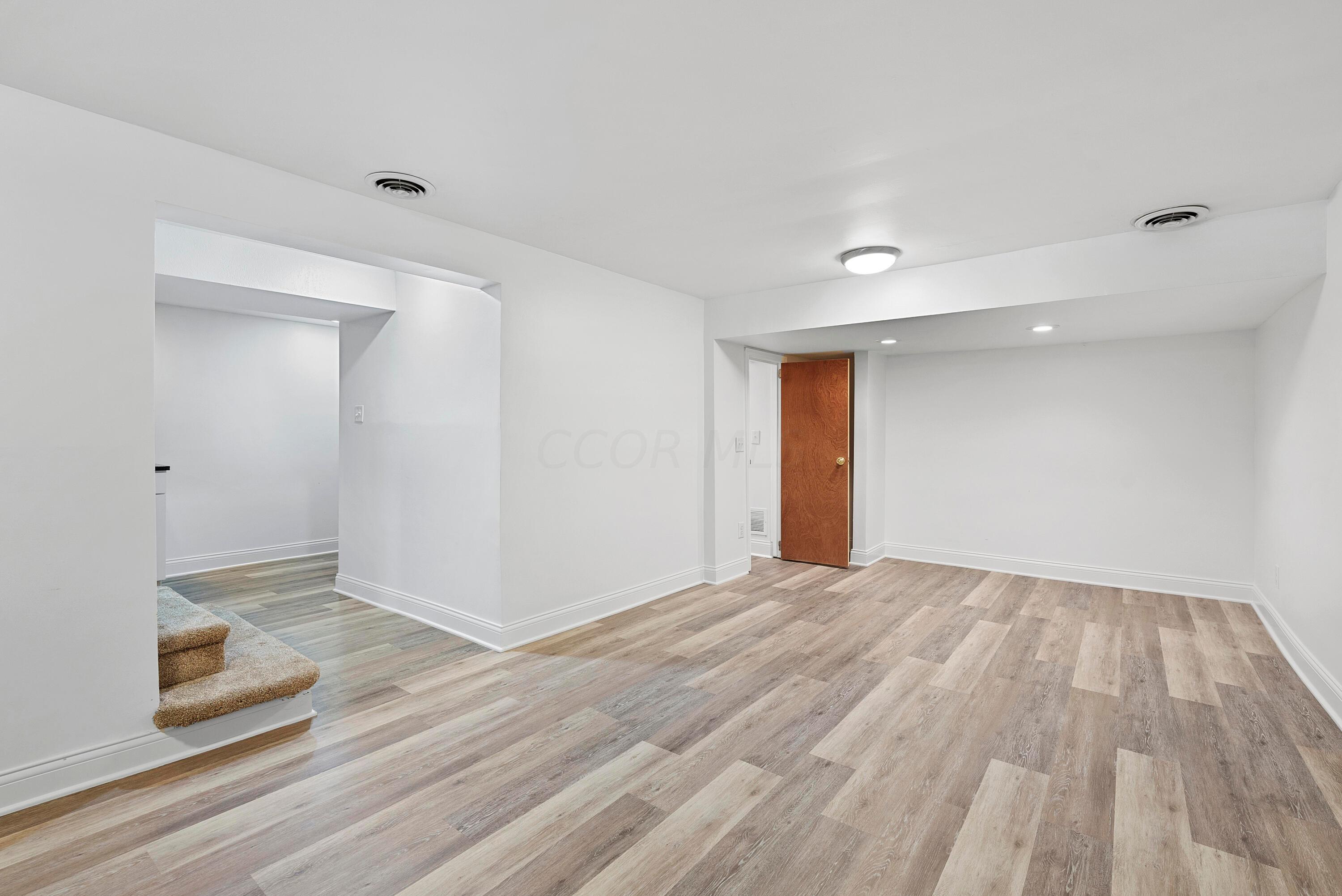 2483 Fishinger Road Columbus, OH 43221 - Photo 26 of 38 Downstairs Rec Room