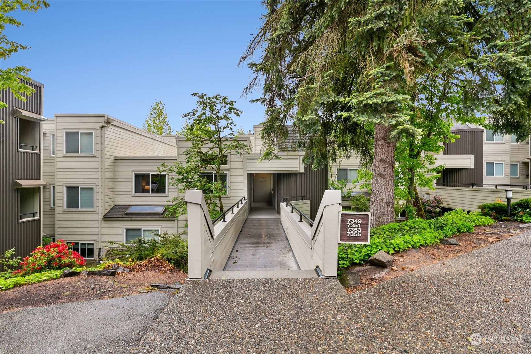 7355 Old Redmond Road, Unit 113 Redmond, WA 98052 - Photo 1 of 25 front view of house with potted plants and a large tree