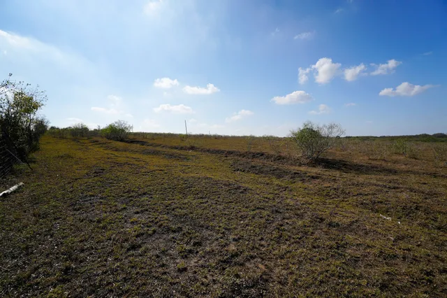 a view of a lake and sunset