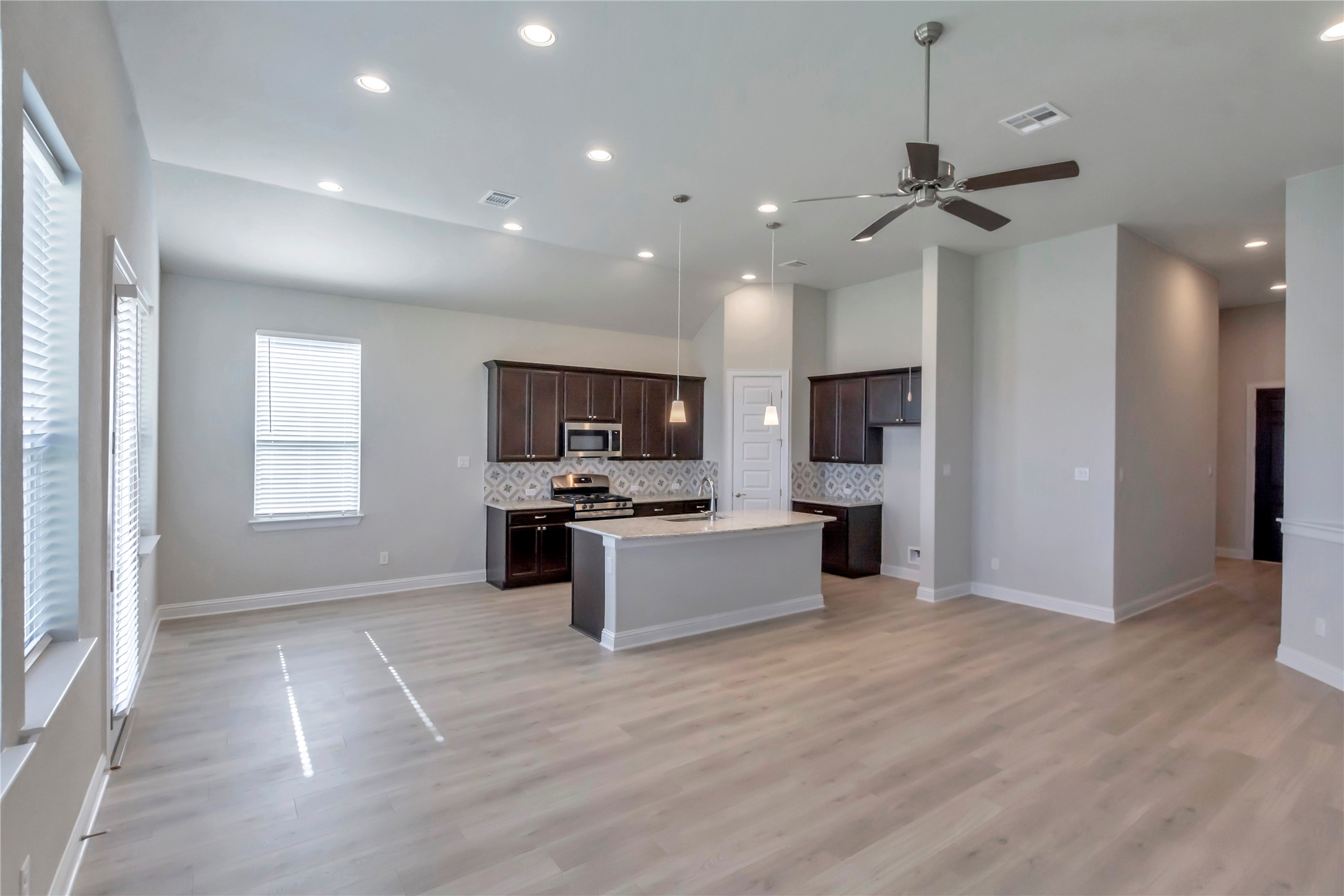 2140 Base Burner Path Leander, TX 78641 - Photo 7 of 27 a view of kitchen with sink microwave and stove