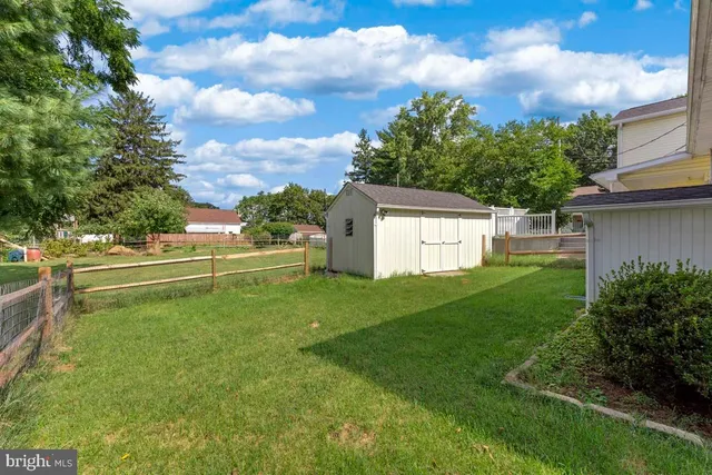 a view of a backyard with a garden