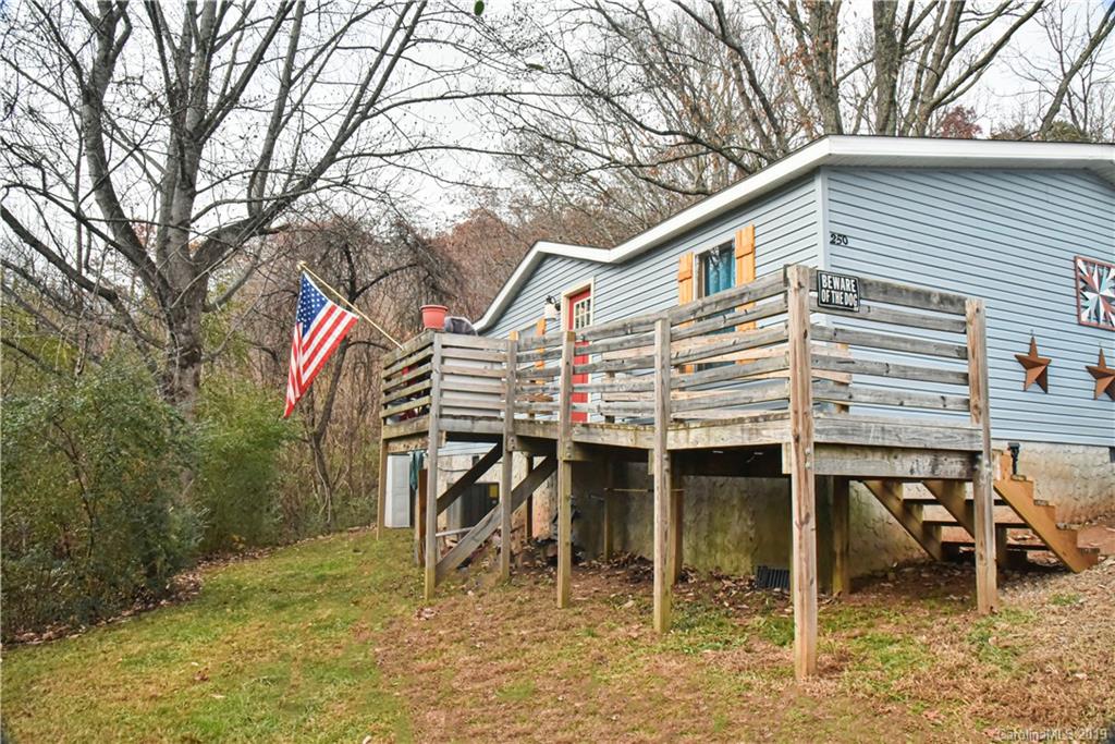 250 Mount Allen Road Black Mountain, NC 28711 - Photo 1 of 22 a view of a house with a patio