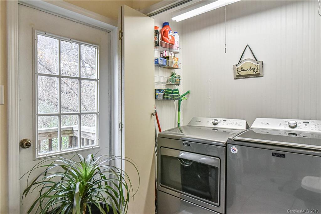 250 Mount Allen Road Black Mountain, NC 28711 - Photo 18 of 22 a room with storage and utility