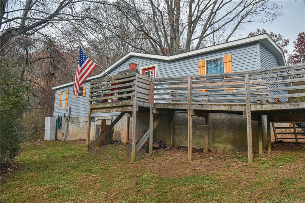 250 Mount Allen Road Black Mountain, NC 28711 - Photo 3 of 22 a front view of a house with a garden