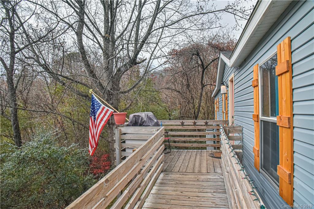 250 Mount Allen Road Black Mountain, NC 28711 - Photo 5 of 22 a view of balcony and wooden floor