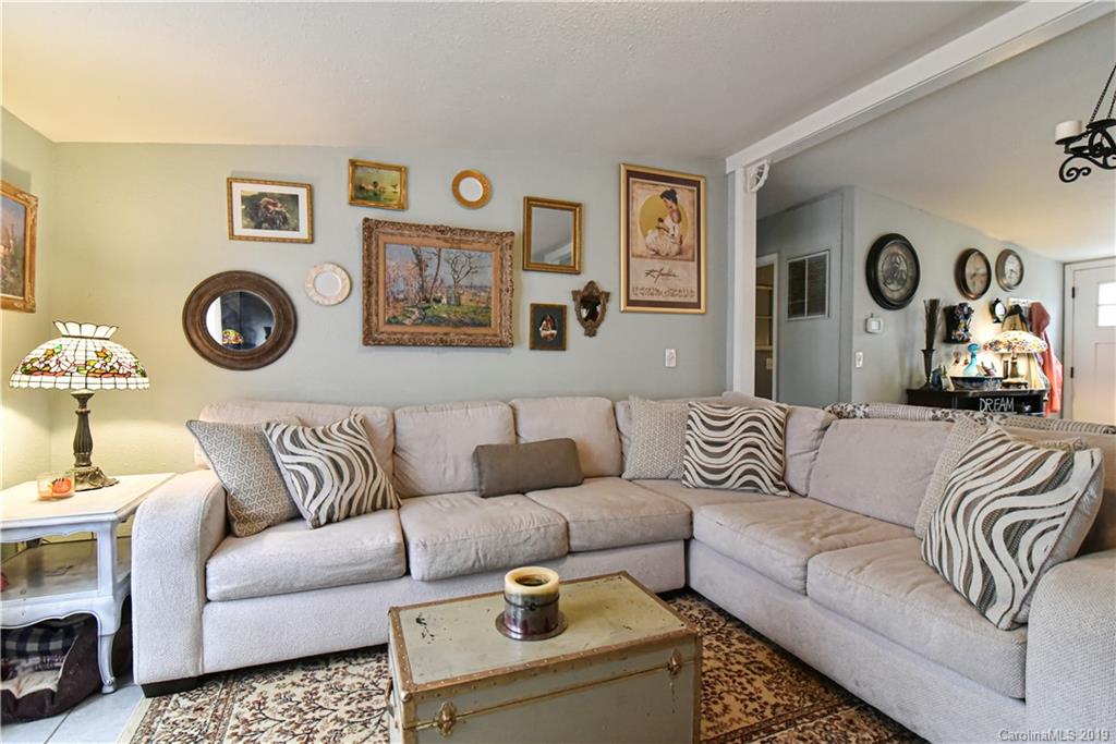 250 Mount Allen Road Black Mountain, NC 28711 - Photo 10 of 22 a living room with furniture and a couch