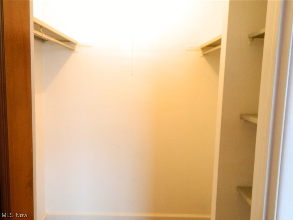10744 Valley View Road, Unit B8 Northfield, OH 44067 - Photo 10 of 15 What's not to like about this large walk-in closet w/shelves for storage, also.