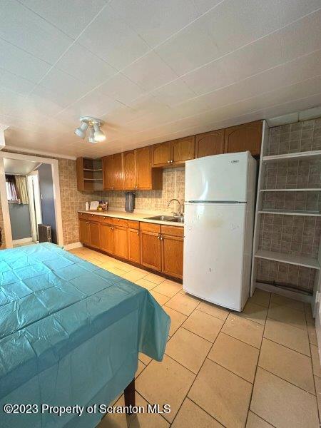 428 Cherry Street Scranton, PA 18505 - Photo 8 of 29 a kitchen with a cabinets and a refrigerator