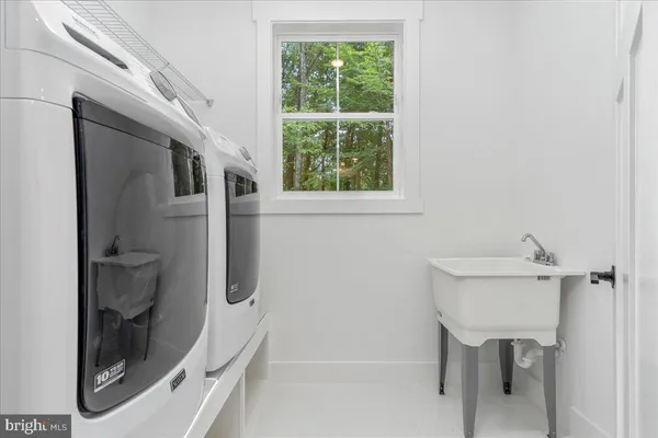 a bathroom with a shower and toilet
