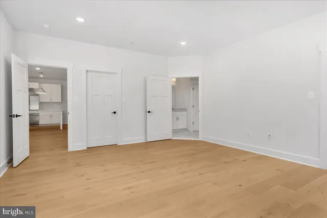 a bathroom with a sink vanity and a mirror