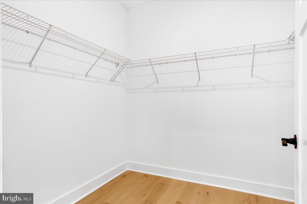 8 Grim Road Stephens City, VA 22655 - Photo 21 of 29 a view of a room with racks on the wall