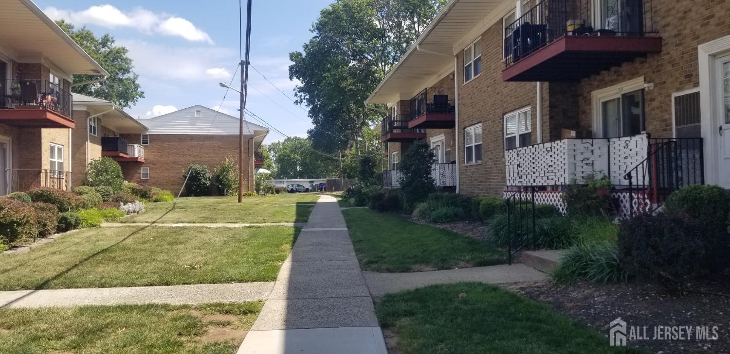 32 Judson Street, Unit 10A Edison, NJ 08837 - Photo 11 of 12 a front view of a house with a yard