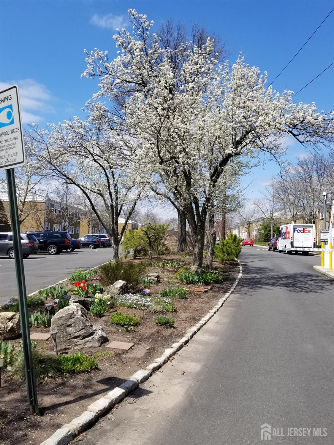 32 Judson Street, Unit 10A Edison, NJ 08837 - Photo 2 of 12 a view of a street with a couple of cars parked on the roadside