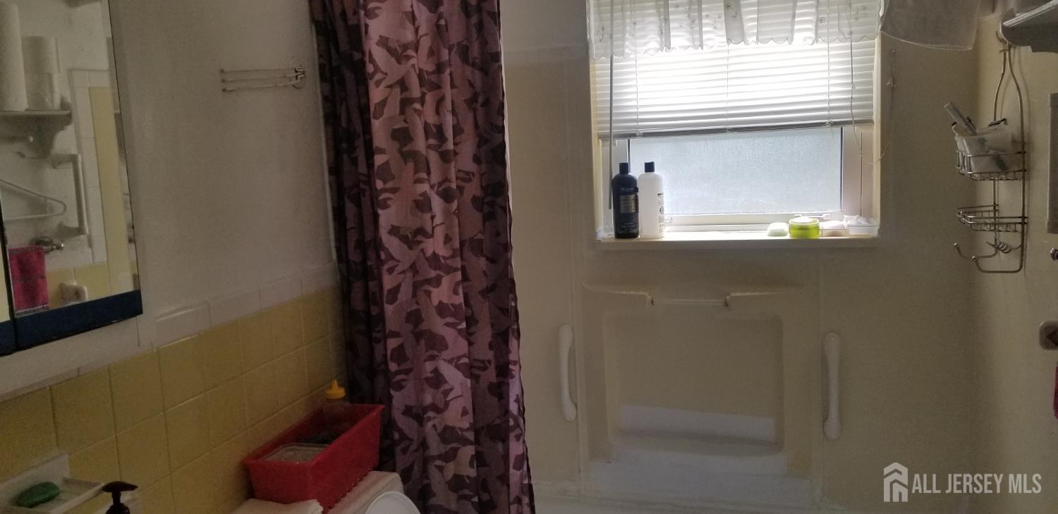 32 Judson Street, Unit 10A Edison, NJ 08837 - Photo 9 of 12 a bathroom with a shower