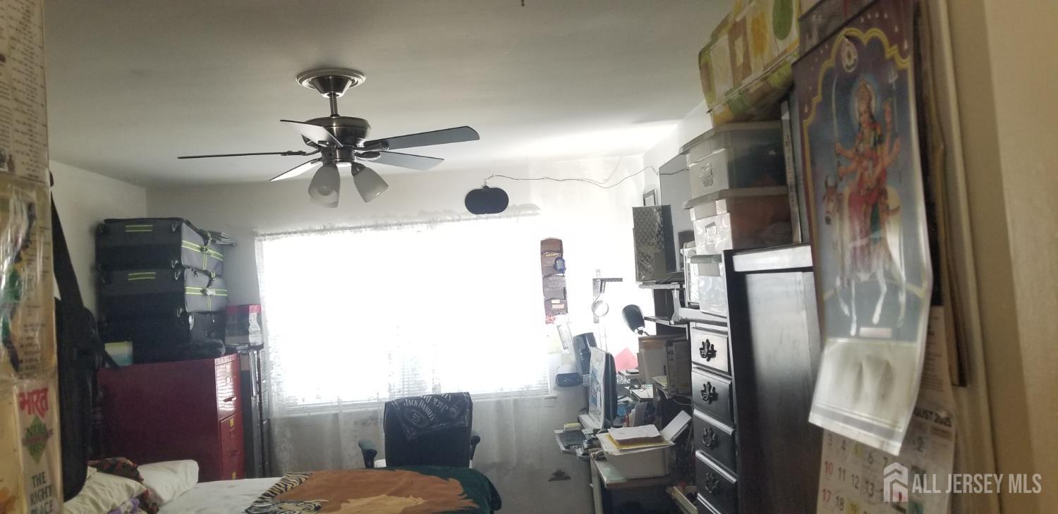 32 Judson Street, Unit 10A Edison, NJ 08837 - Photo 10 of 12 a bathroom with a glass shower door