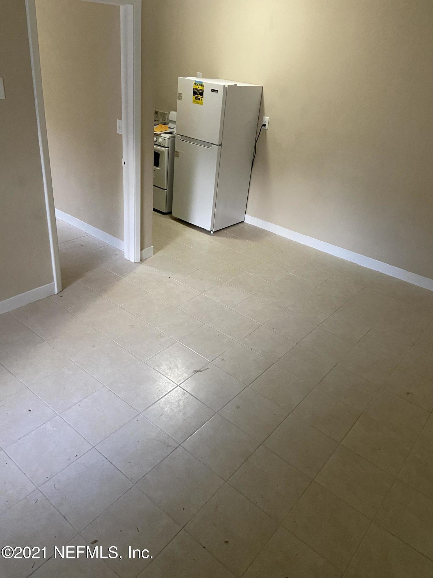 5643 Merrill Road, Unit 4 Jacksonville, FL 32277 - Photo 6 of 9 a view of a storage & utility room with a sink