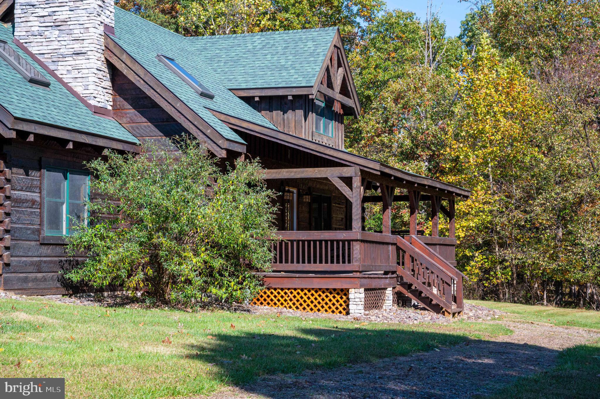 10201 Leetown Road Kearneysville, WV 25430 - Photo 117 of 133 a view of a house with a yard deck and furniture