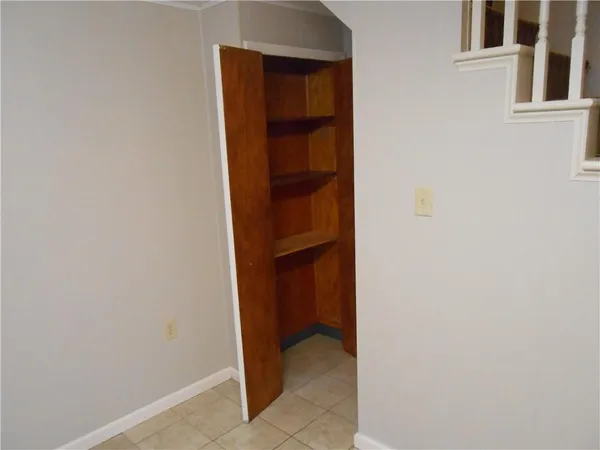 a bath tub sitting next to a shower