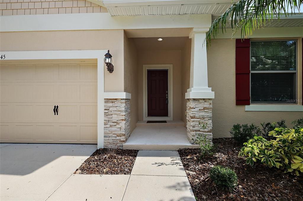 20945 Oldenburg Loop Mount Dora, FL 32757 - Photo 2 of 37 a front view of a house