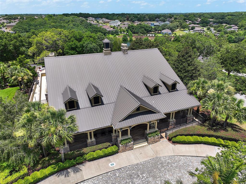20945 Oldenburg Loop Mount Dora, FL 32757 - Photo 33 of 37 an aerial view of a house with yard and mountain view in back