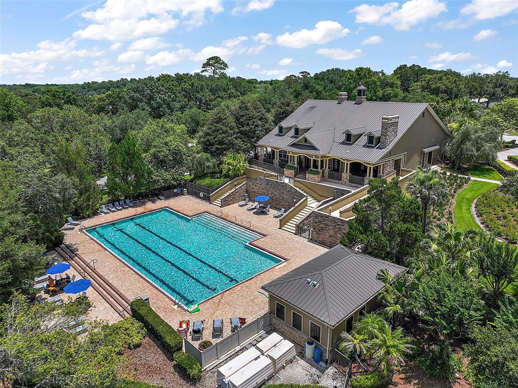 20945 Oldenburg Loop Mount Dora, FL 32757 - Photo 36 of 37 an aerial view of a house with a garden