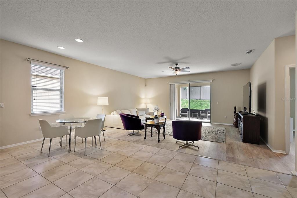 20945 Oldenburg Loop Mount Dora, FL 32757 - Photo 4 of 37 a view of a dining room with furniture