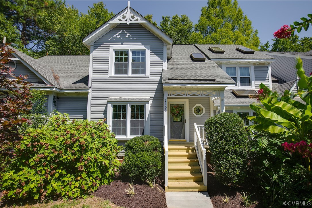 front view of a house with a yard