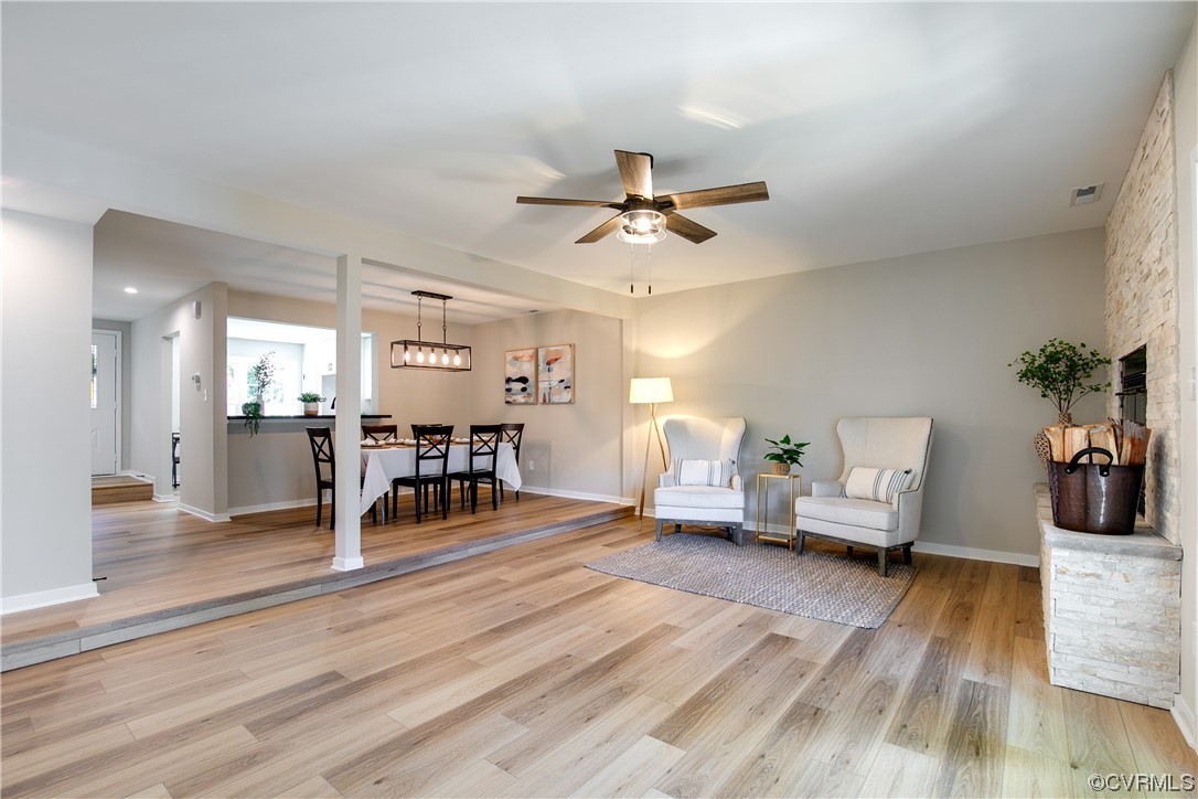 2102 Waters Mill Pointe Richmond, VA 23235 - Photo 18 of 43 a living room with furniture and wooden floor