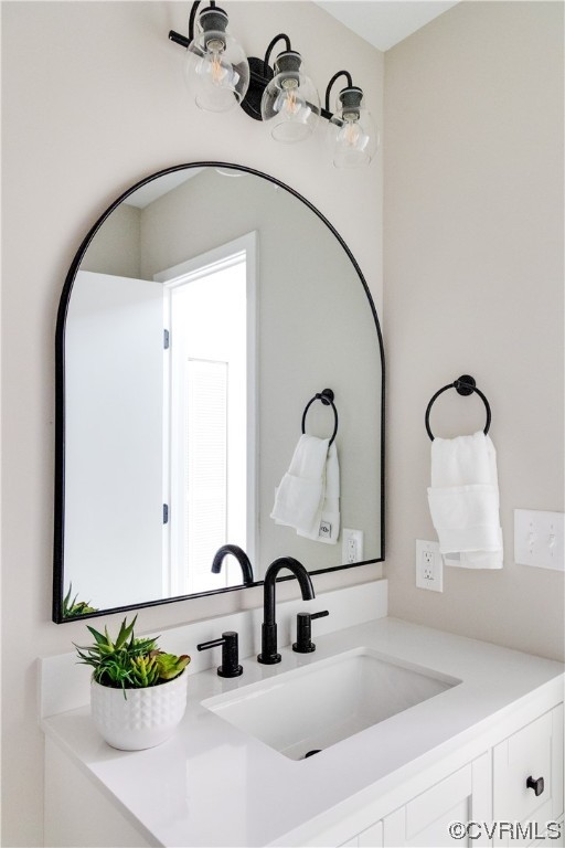 2102 Waters Mill Pointe Richmond, VA 23235 - Photo 34 of 43 a bathroom with a sink and a mirror