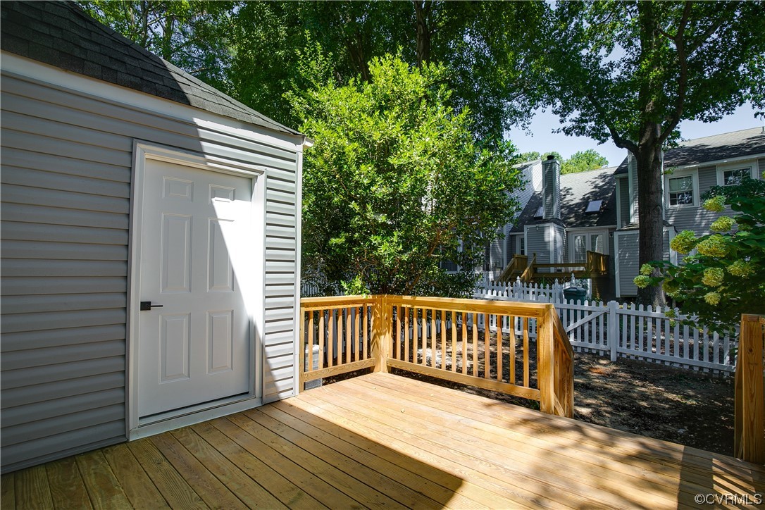 2102 Waters Mill Pointe Richmond, VA 23235 - Photo 38 of 43 a view of backyard with deck and wooden fence