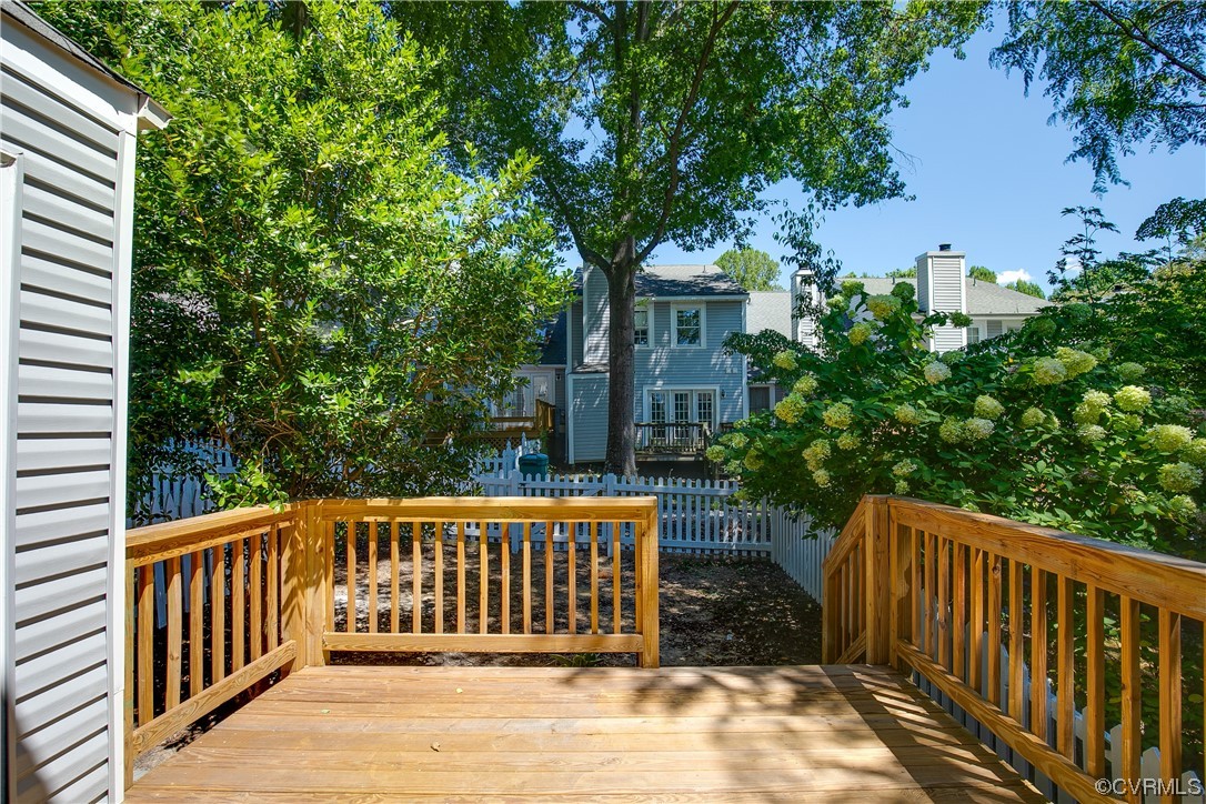 2102 Waters Mill Pointe Richmond, VA 23235 - Photo 39 of 43 a balcony with view of trees in the background