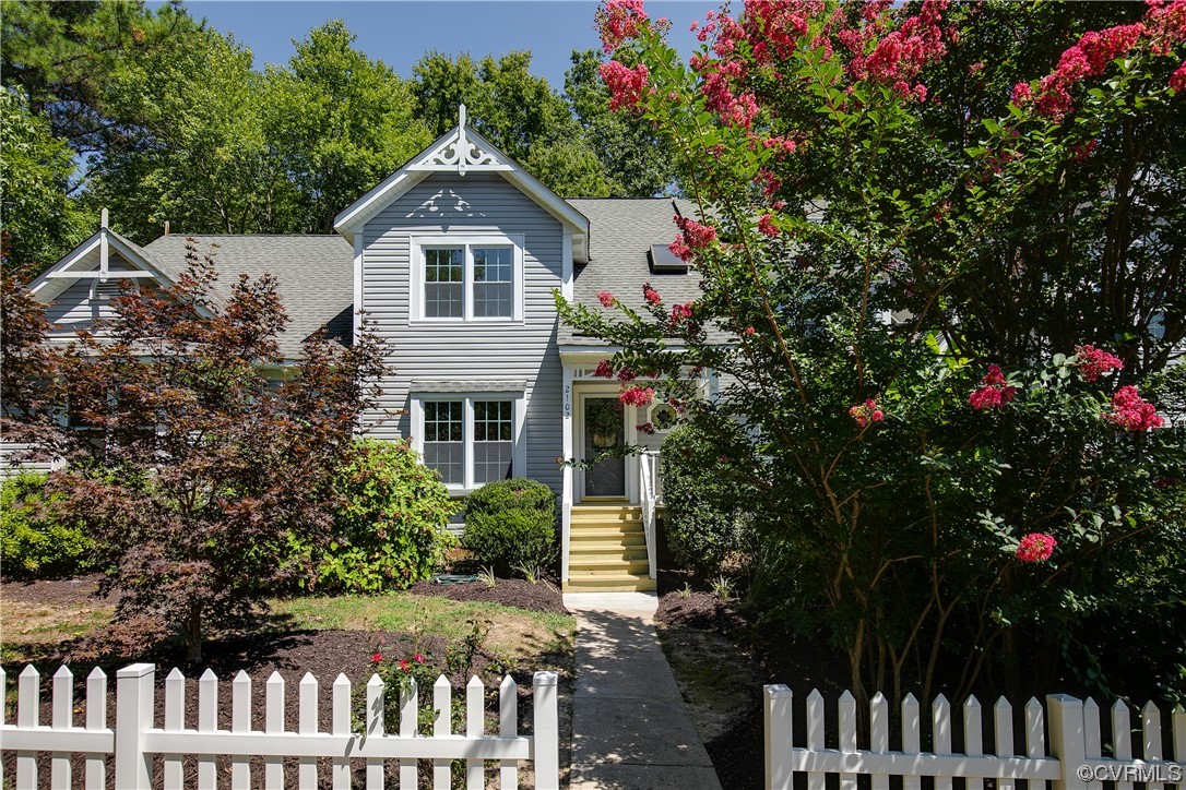 2102 Waters Mill Pointe Richmond, VA 23235 - Photo 42 of 43 a front view of a house with a garden