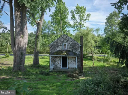 aerial view of a house with a garden