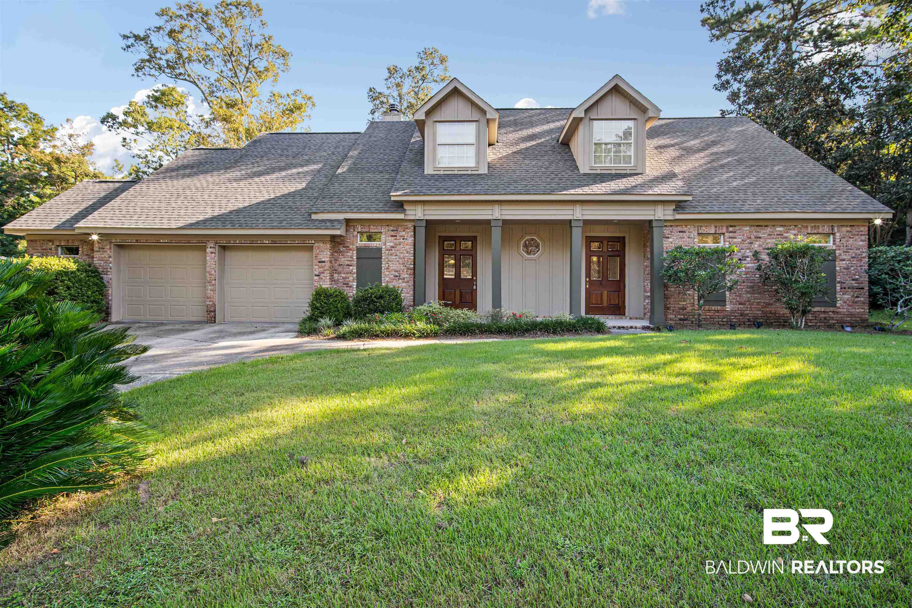 204 General Canby Loop Daphne, AL 36527 - Photo 28 of 36 Cape cod home featuring a front yard and a garage