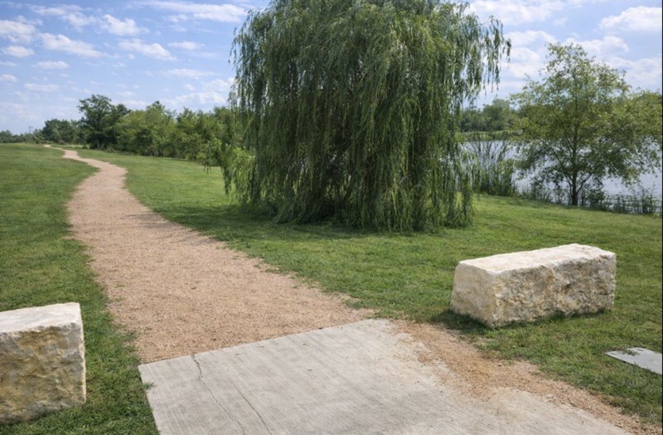 1052 Hot Spring Valley Buda, TX 78610 - Photo 35 of 36 View of community featuring a yard