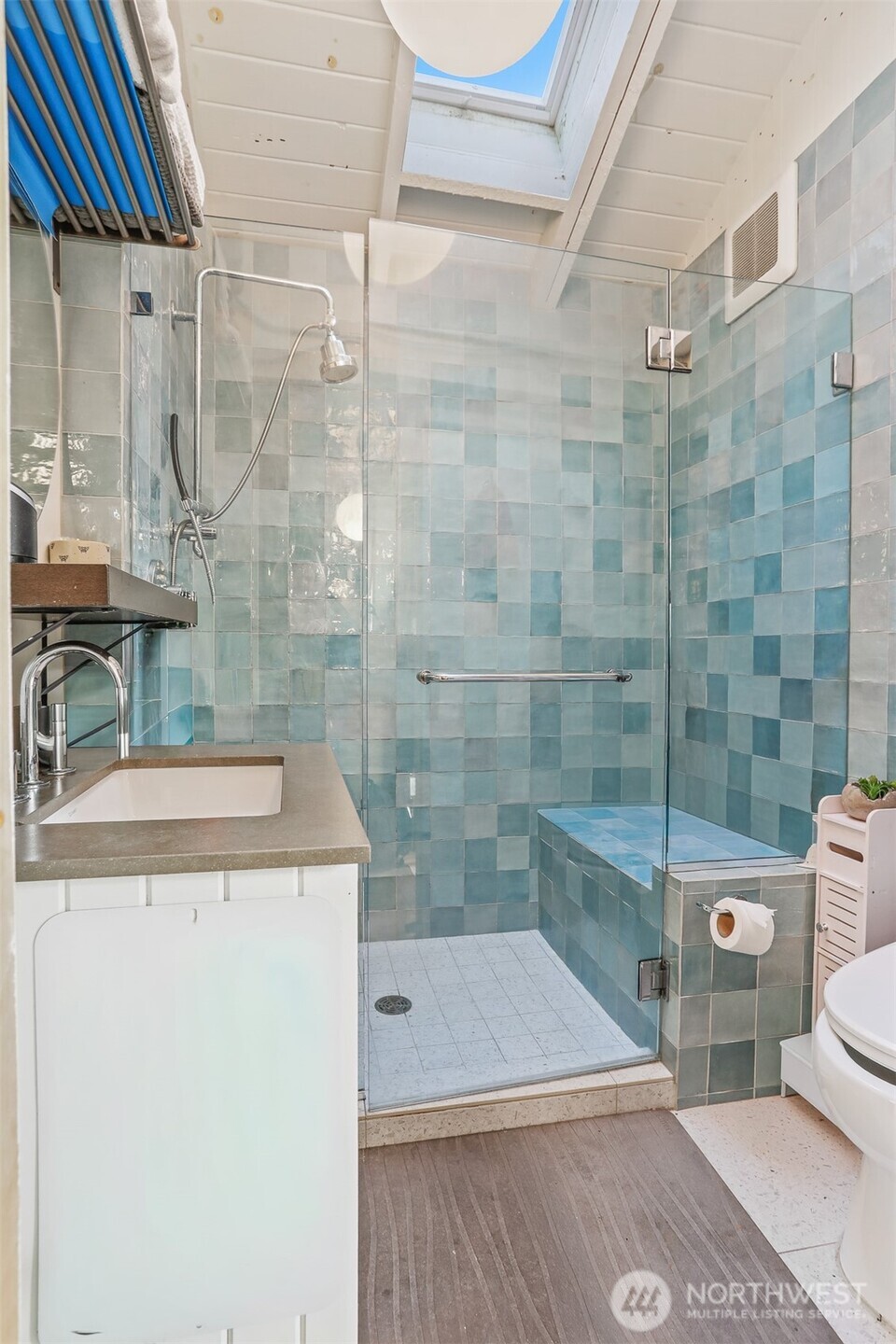 3868 16th Avenue Southwest Seattle, WA 98106 - Photo 20 of 37 a bathroom with a shower and a sink