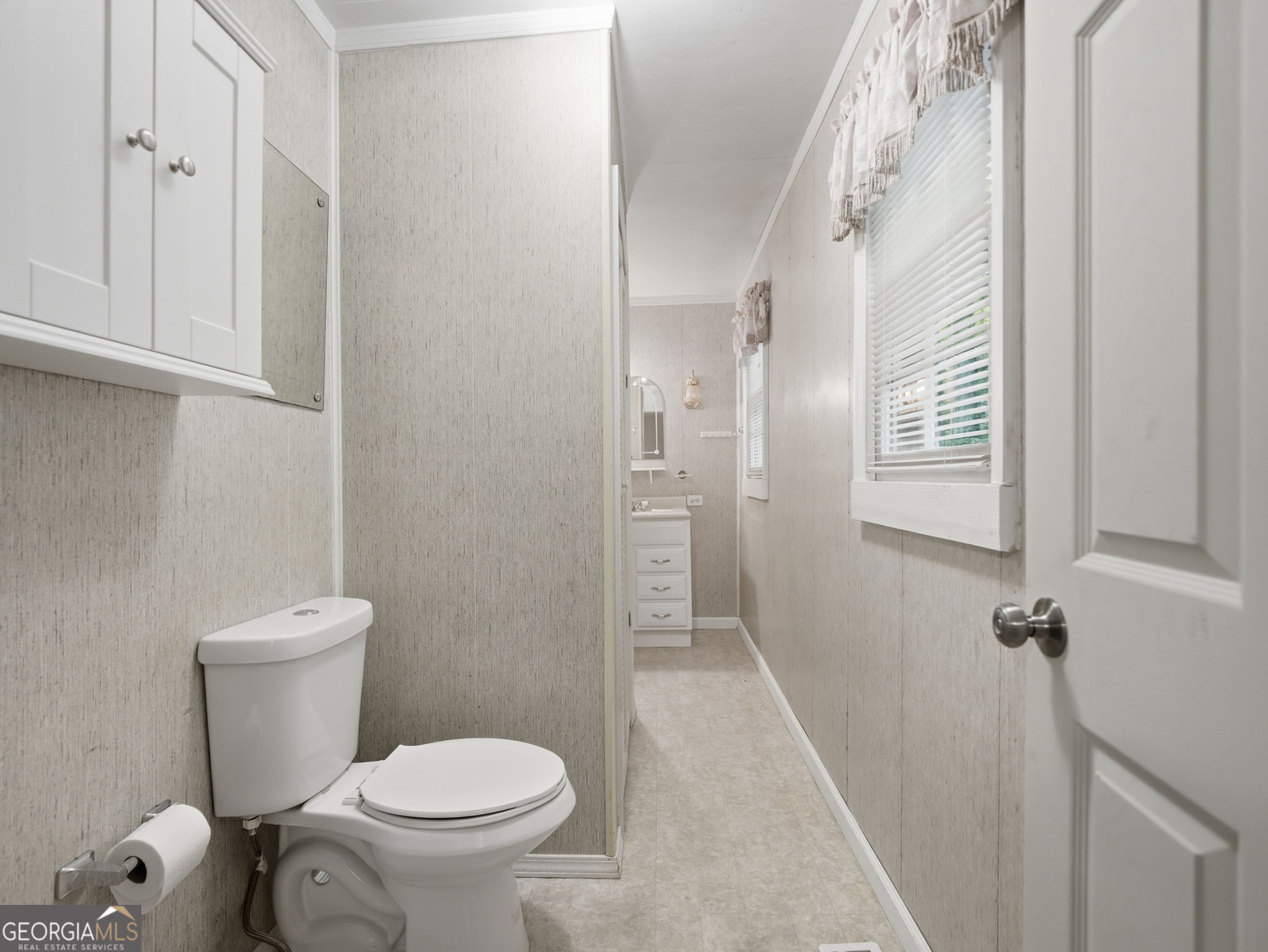 629 Goose Island Road Cherry Log, GA 30522 - Photo 18 of 52 a bathroom with a toilet and a shower