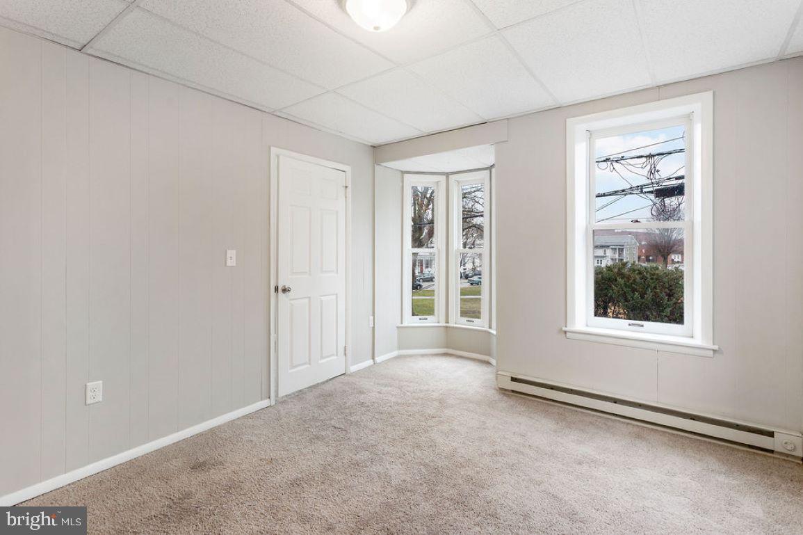 128 High Street Hanover, PA 17331 - Photo 11 of 36 an empty room with windows